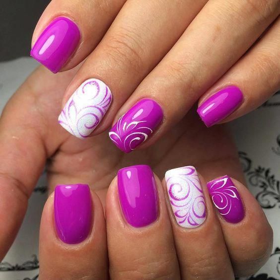 Elegant Vibrant Purple Nail Design with Glossy Finishes and Intricate White Swirls.