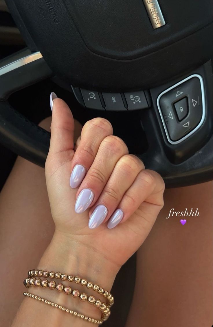 Chic Elegant Lavender Oval Nails with Glossy Shine for Any Occasion.