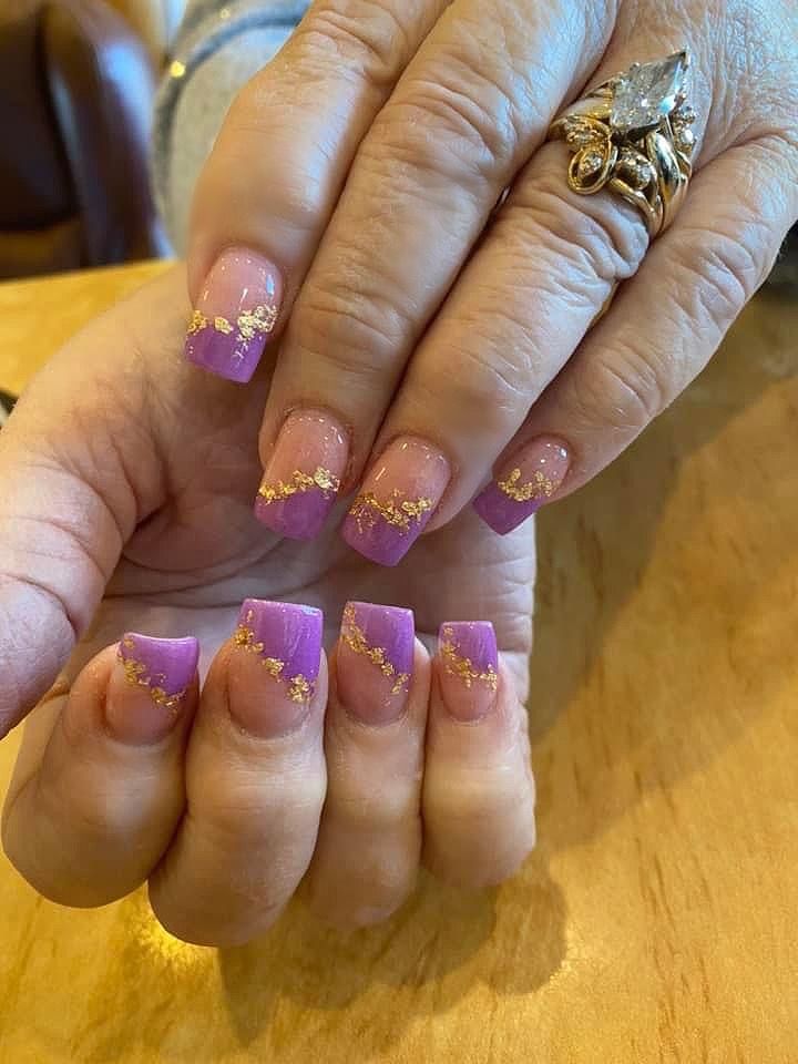 Elegant Vibrant Purple Nails with Gold Accents and Gradient Effect