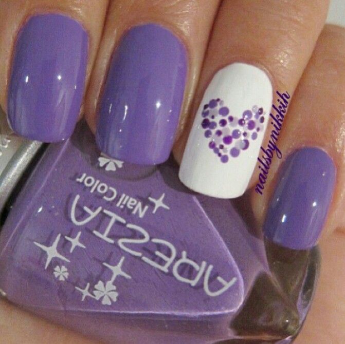 Sophisticated Lavender Manicure with Statement Heart Design.