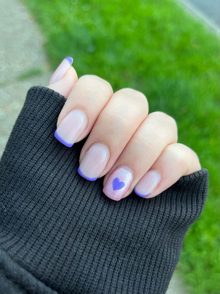 Elegant Chic Nail Design with Soft Nude Base and Playful Lavender Tips