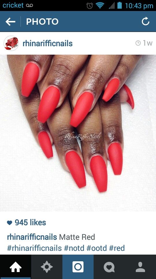 Bold Matte Red Nail Design: Long Elegantly Pointed Shapes for a Modern Yet Classic Statement.