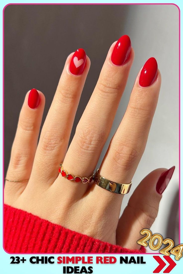 Chic Almond-Shaped Red Nail Design with Heart Accent and Elegant Accessories.