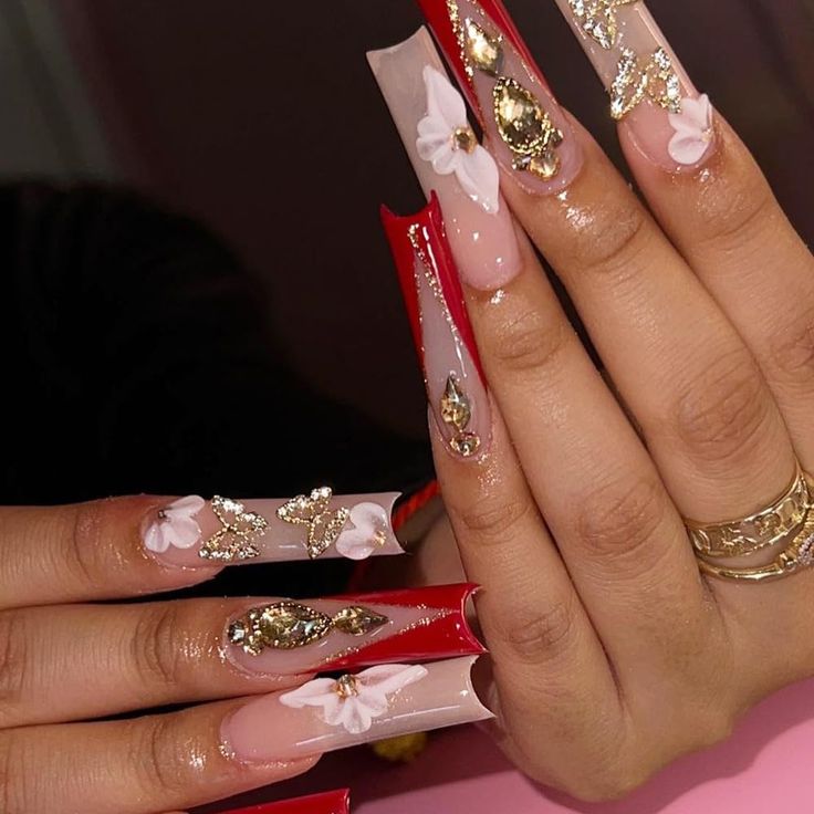 Elegant Red and Clear Long Nails with Gold Accents and Floral Embellishments