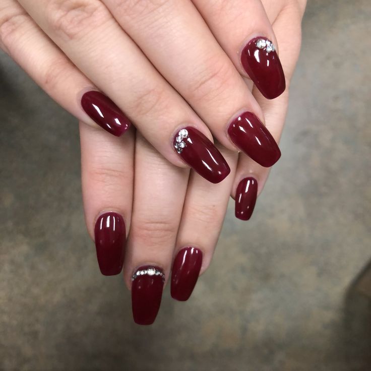 Sophisticated Burgundy Manicure with Rhinestone Accents for Any Occasion