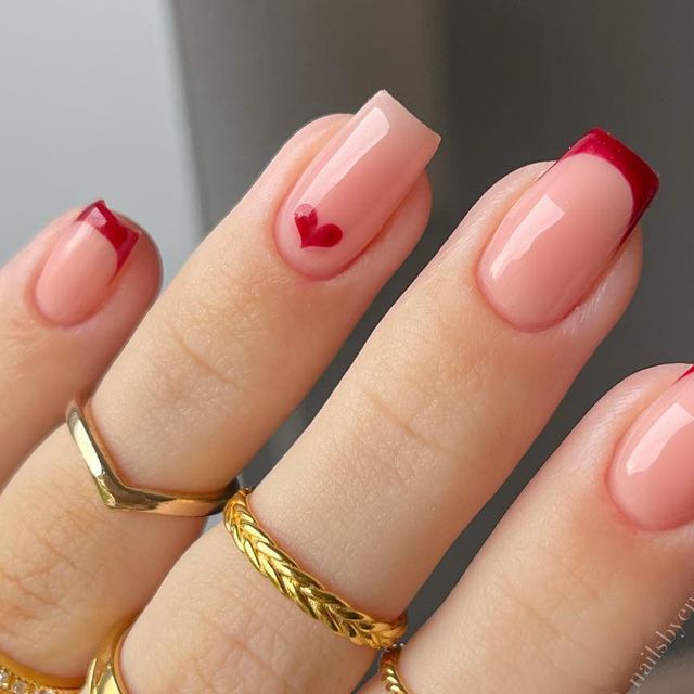 Elegant Nude and Red Heart French Tip Nail Design for Any Occasion