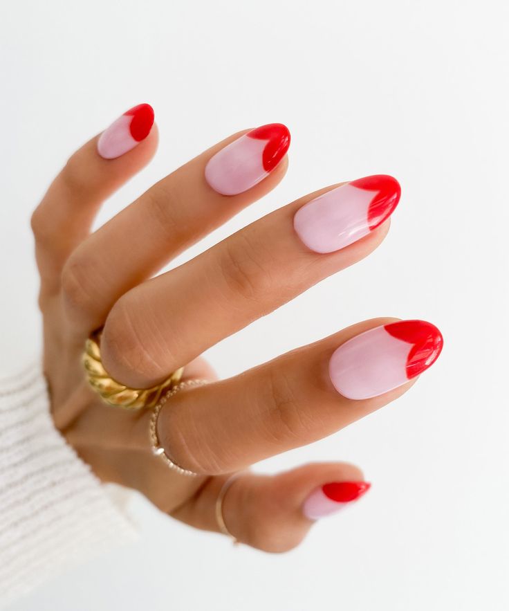 Chic Nail Design: Elegant Soft Pink Base with Bold Red Accents