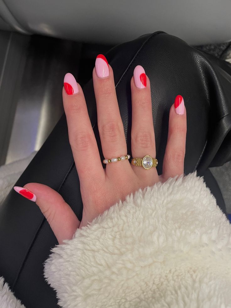 Trendy Chic Nail Design: Bold Red Tips & Soft Pink Base for a Striking Contrast.