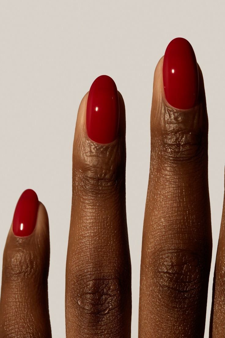 Sophisticated Oval Red Nails: A Timeless Glamour for Any Occasion.