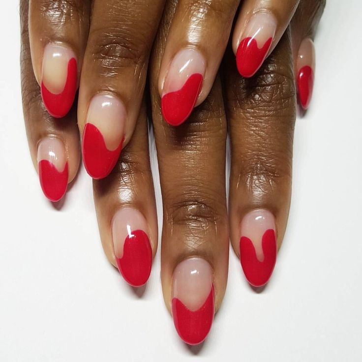 Chic Bold Red Nail Design with Unique Negative Space Technique