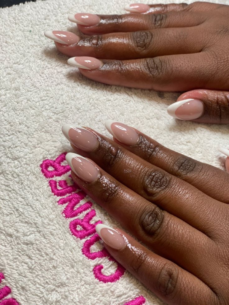 Sophisticated Almond-Shaped French Manicure: Soft Pink Base with Classic White Tips.