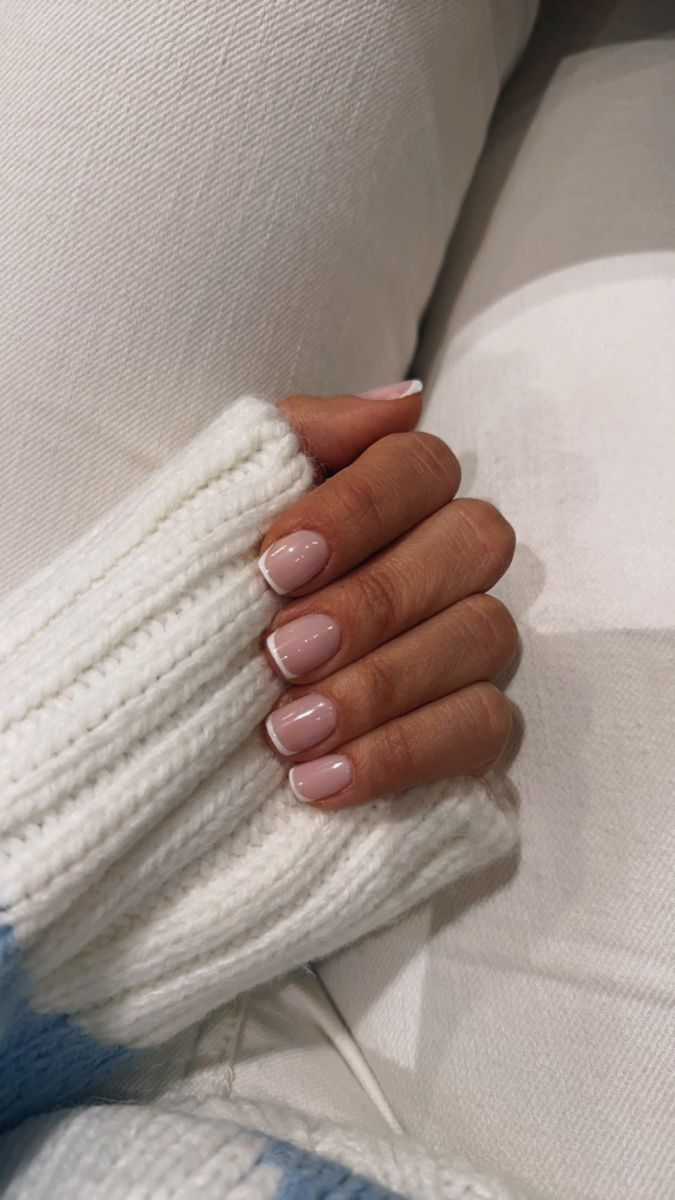 Elegant Blush Pink and White French Tip Nail Design for Sophisticated Occasions.