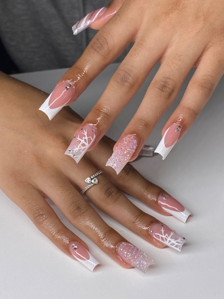 Sophisticated Elegant Nail Design with Soft Pink and Striking White Accents