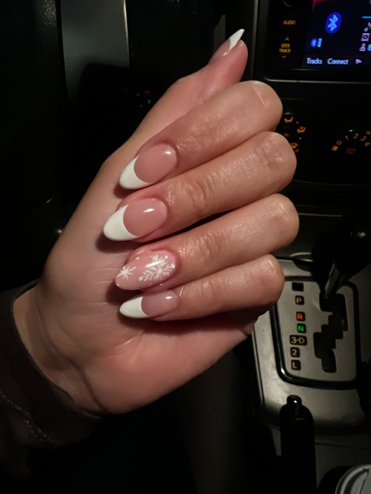 Elegant Winter-Themed French Manicure with Snowflake Accent