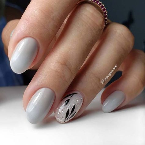 Sophisticated Gray Nail Design with Glossy Finish and Sparkling Accent.