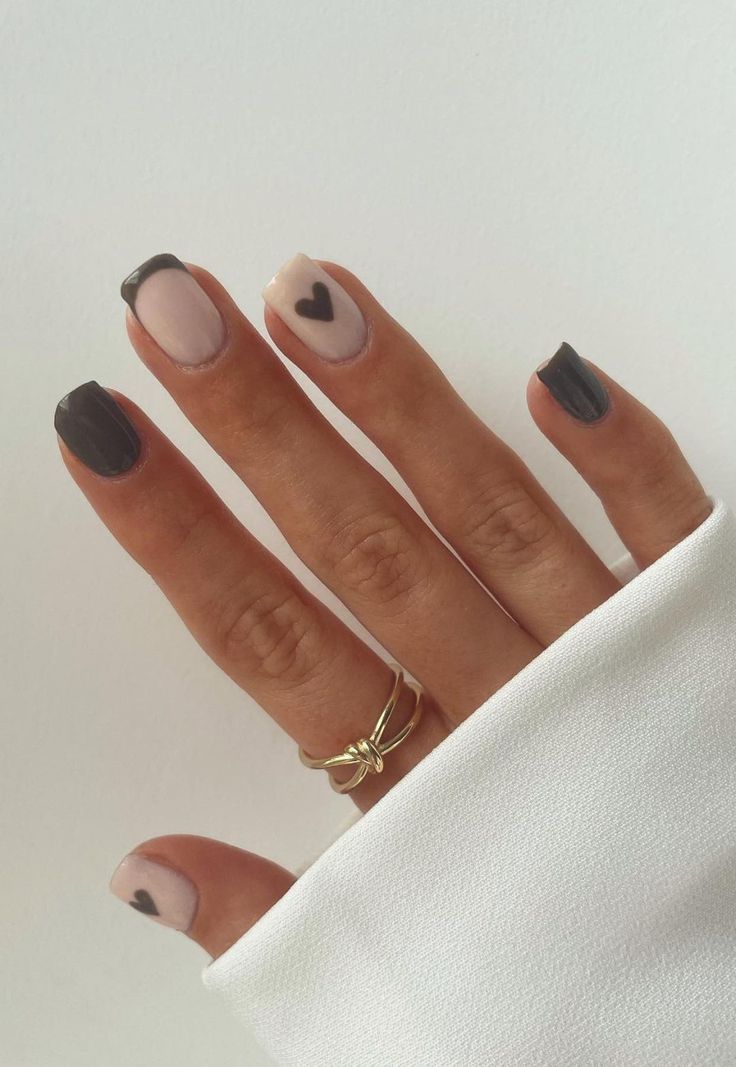 Chic Muted Tone Nail Design with Elegant Heart Accents