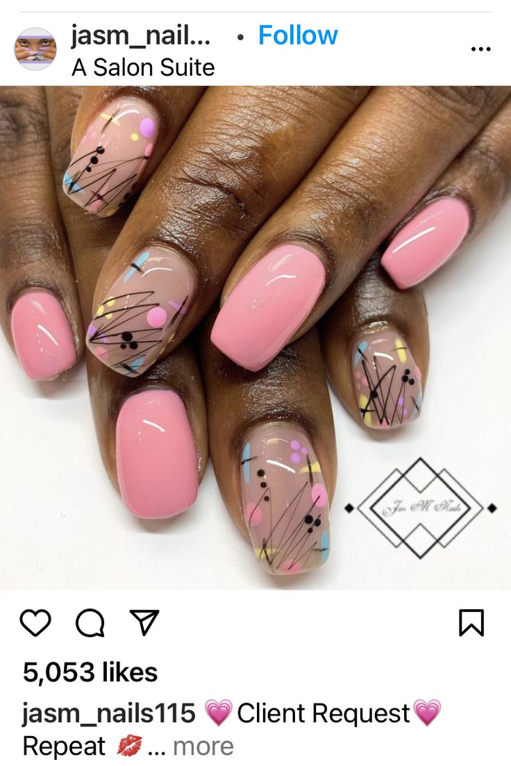 Artistic Soft Pink Nail Design with Playful Patterns and Geometric Accents