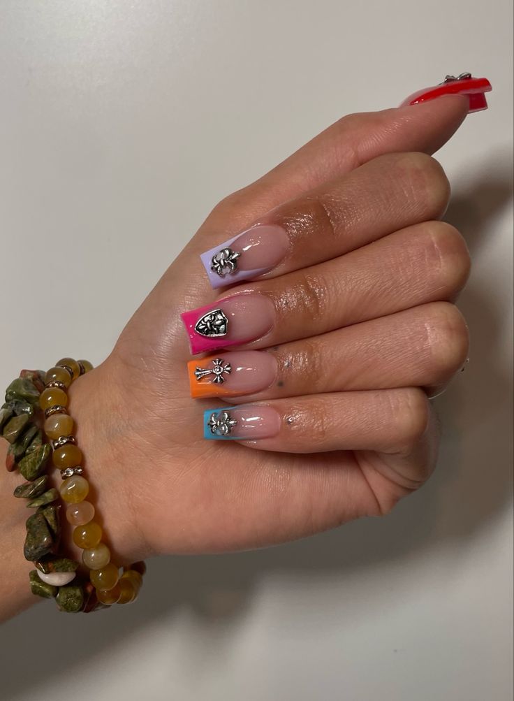 Playful Pastel and Vibrant Nail Design with Unique Metallic Accents