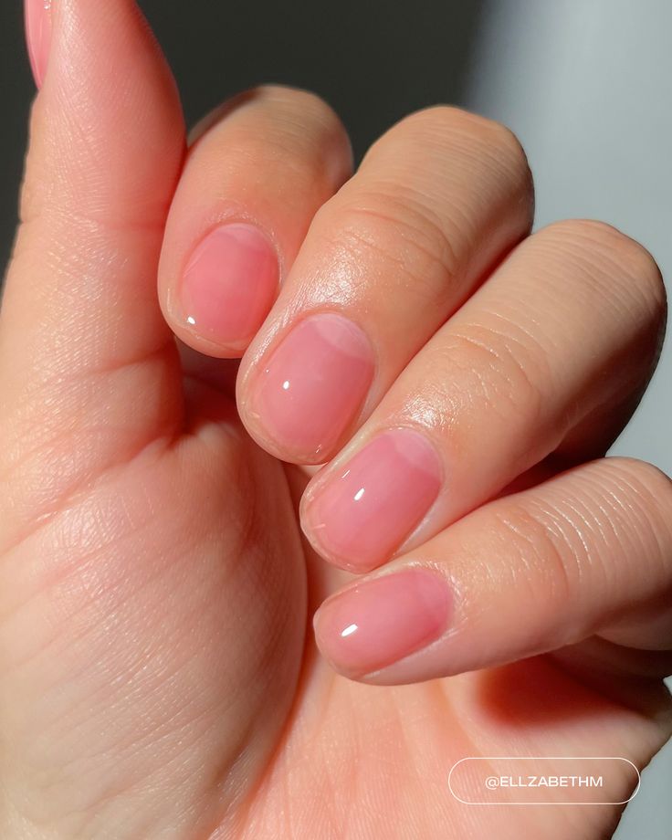 Sophisticated Glossy Nude Nails for Effortless Elegance.