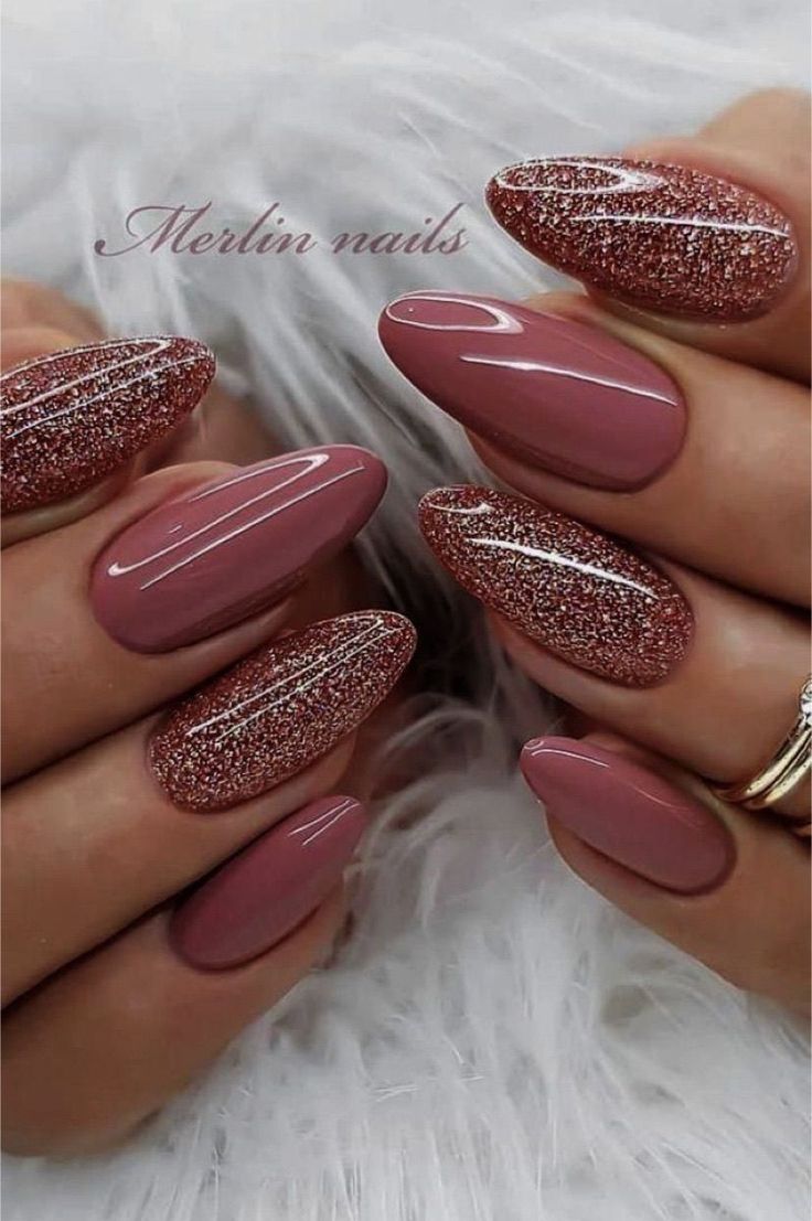 Sophisticated Almond-Shaped Nail Design with Matte and Glitter Accents in Soft Pink.