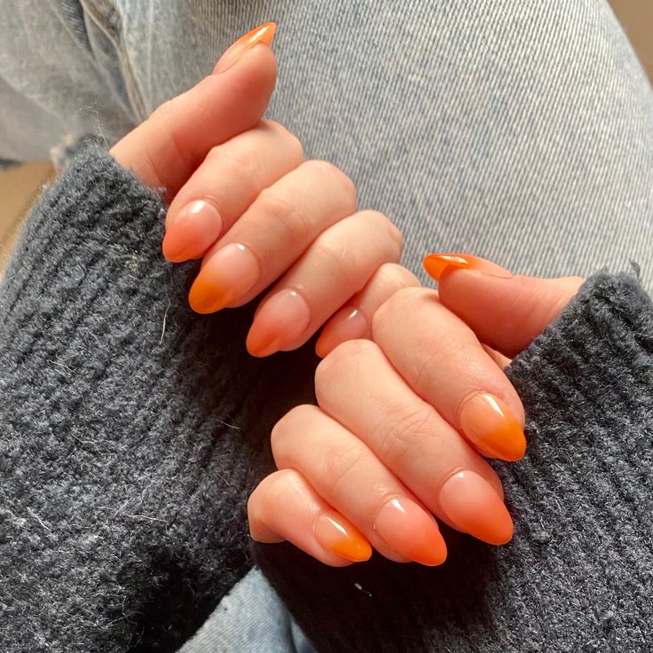 Warm Ombre Orange Nail Design: A Perfect Blend of Natural Elegance and Bold Color.