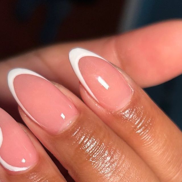 Chic Soft Pink Nail Design with Classic White French Tips for Timeless Elegance.