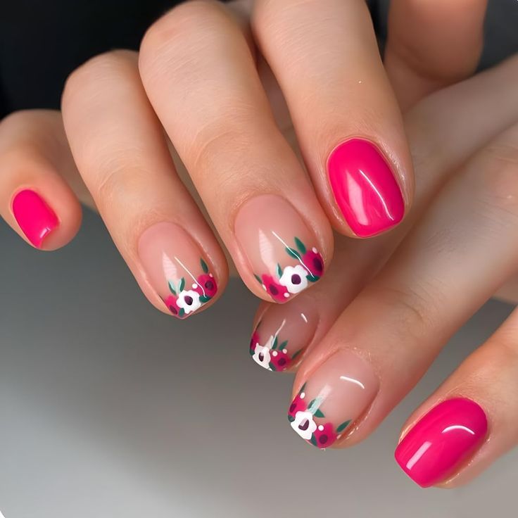 Vibrant Floral Nail Design: Playful Colors and Elegant Patterns for a Chic Summer Look.