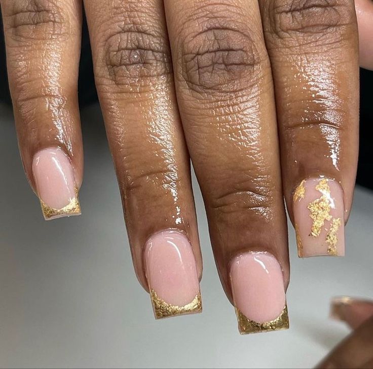 Chic Nude Nail Design with Luxurious Gold Accents for Any Occasion