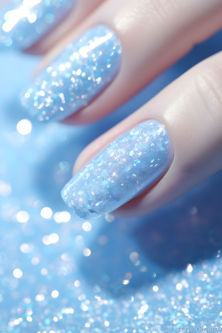 Whimsical Sparkling Blue Nails: A Perfect Blend of Playful Elegance for Any Occasion