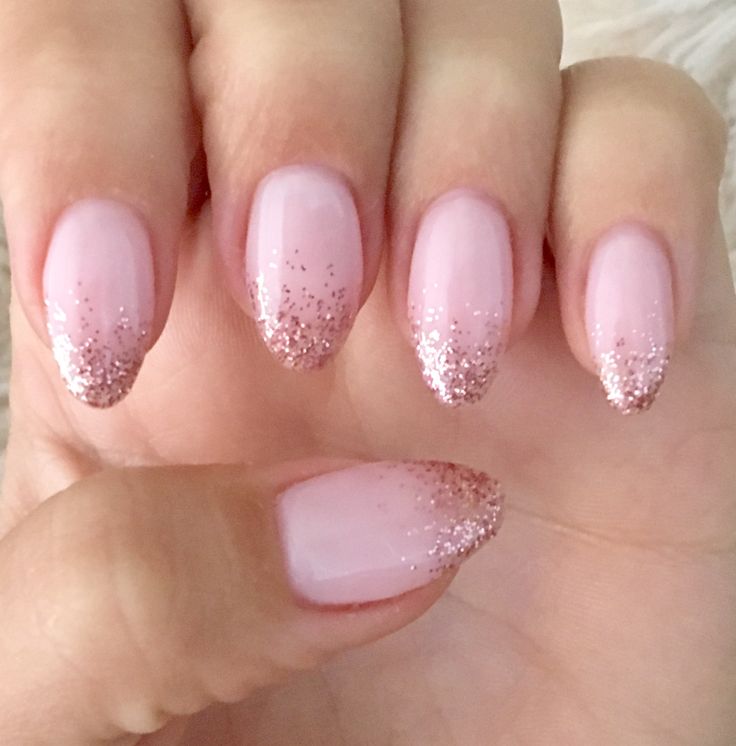 Elegant Sparkling Ombre Nails: A Playful Blend of Soft Pink and Glitter Tips