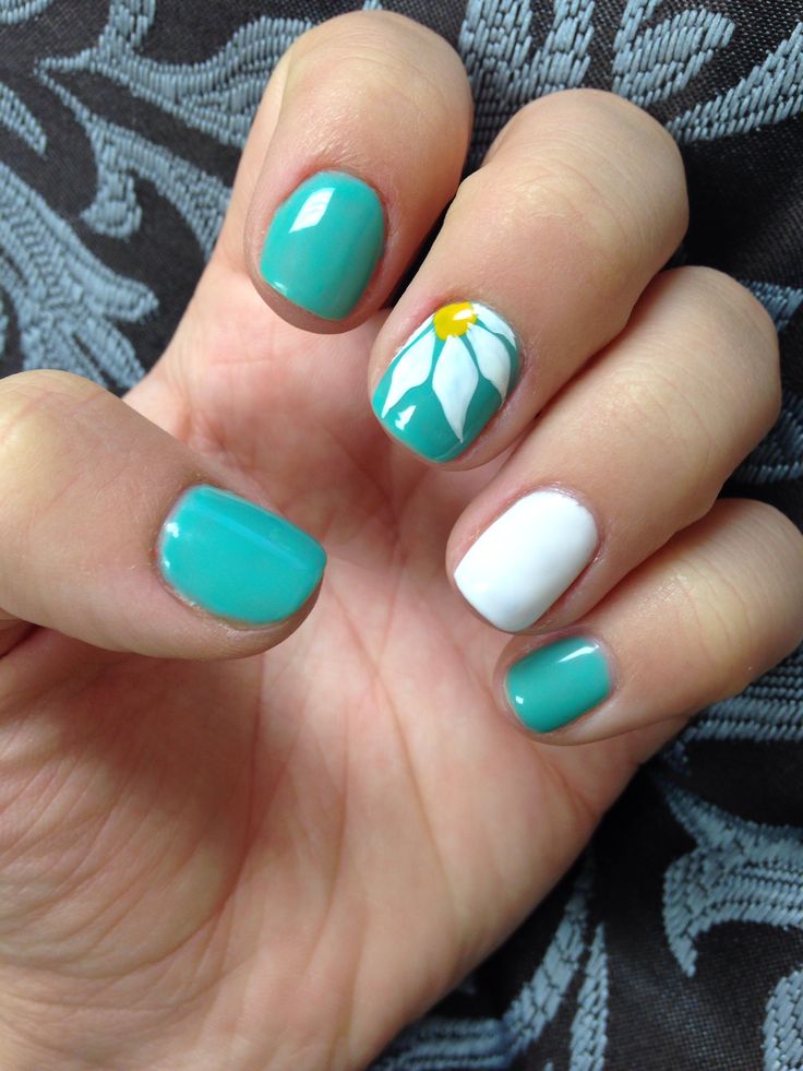 Playful Elegant Turquoise Nail Design with Hand-Painted Flower Accent