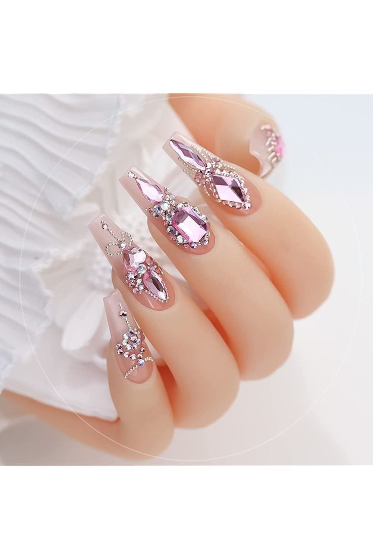 Chic Nude Coffin Nails Embellished with Pink and Clear Rhinestones for Glamorous Occasions.