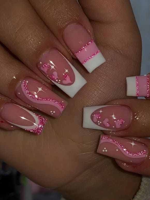 Whimsical Glittery Pink and White Nail Design for a Trendy Manicure