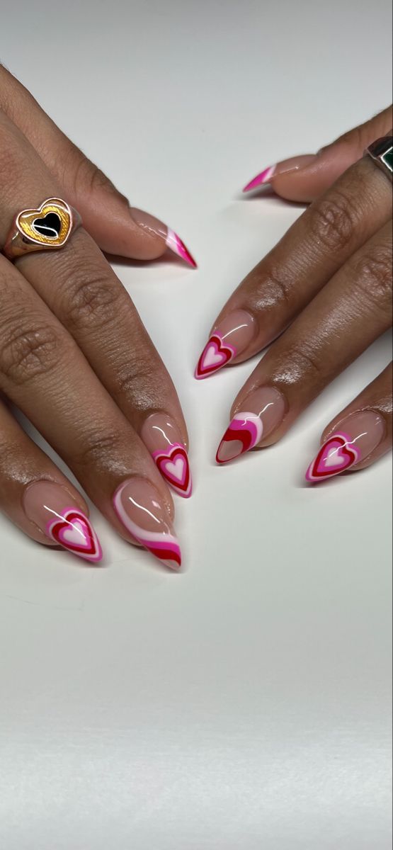 Elegant Heart-Shaped Nail Design: Vibrant Pink on Nude for Playful Romance.