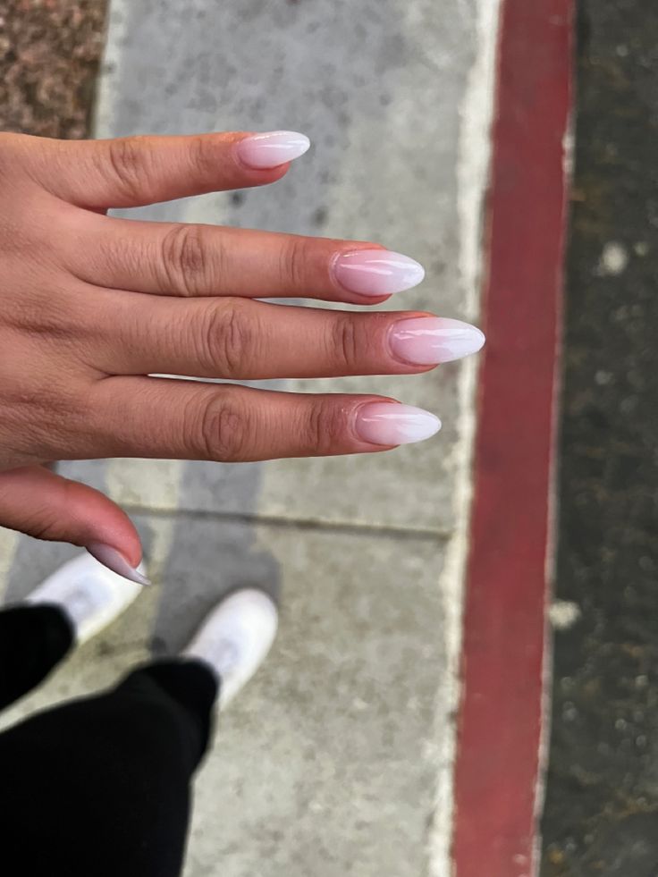 Elegant Almond-Shaped Ombre Nails: A Modern Take on Classic Feminine Beauty.