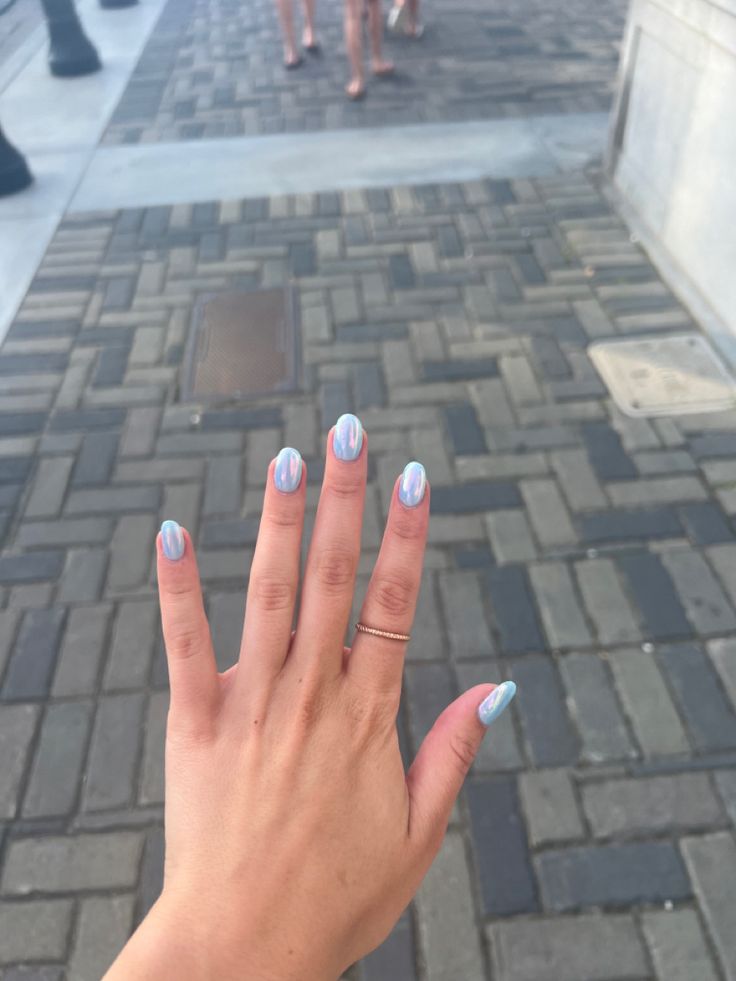 Iridescent Pastel Nails: A Modern Twist on Soft Blue Elegance.