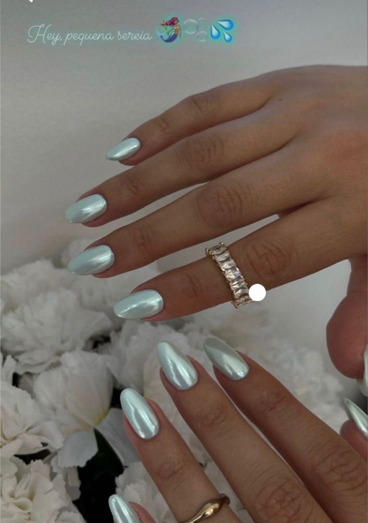 Elegant Glossy Pastel Blue Almond Nails: A Chic Blend for Any Occasion