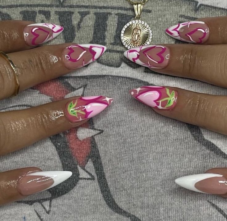 Playful Heart-patterned Nail Design with Bright Pinks, Whites, and Elegant Floral Accents.