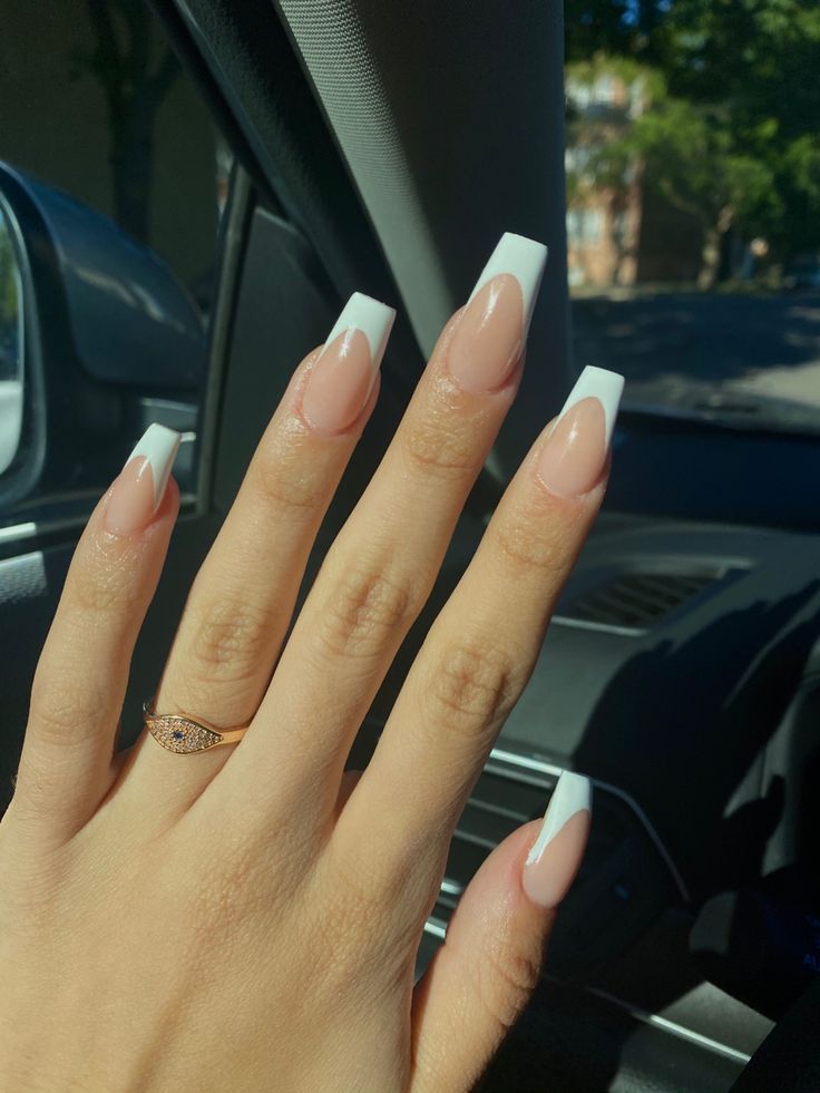 Elegant Chic: Modern French Tip Nails with Nude Base and Defined White Tips