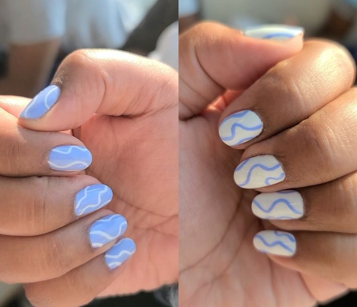 Elegant Swirling Blue and White Nail Design for Creative Expression