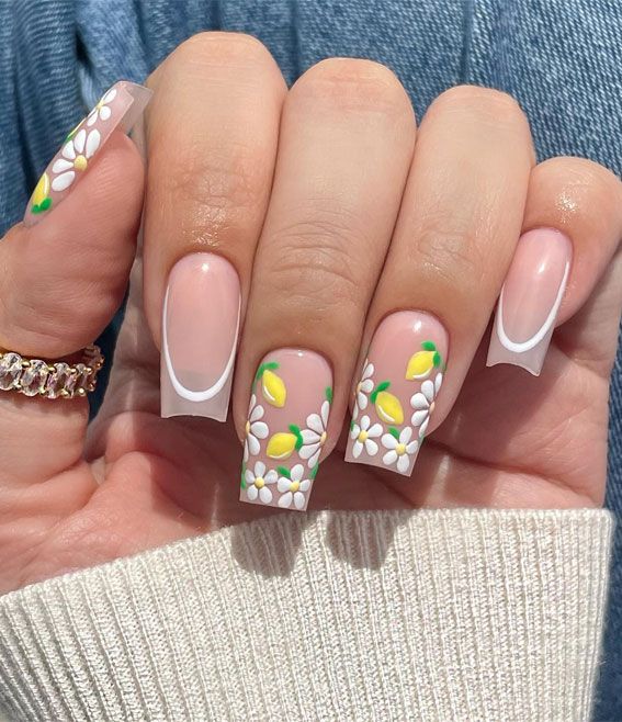 Cheerful Floral Nail Design with Daisies and Lemons on a Soft Nude Base.