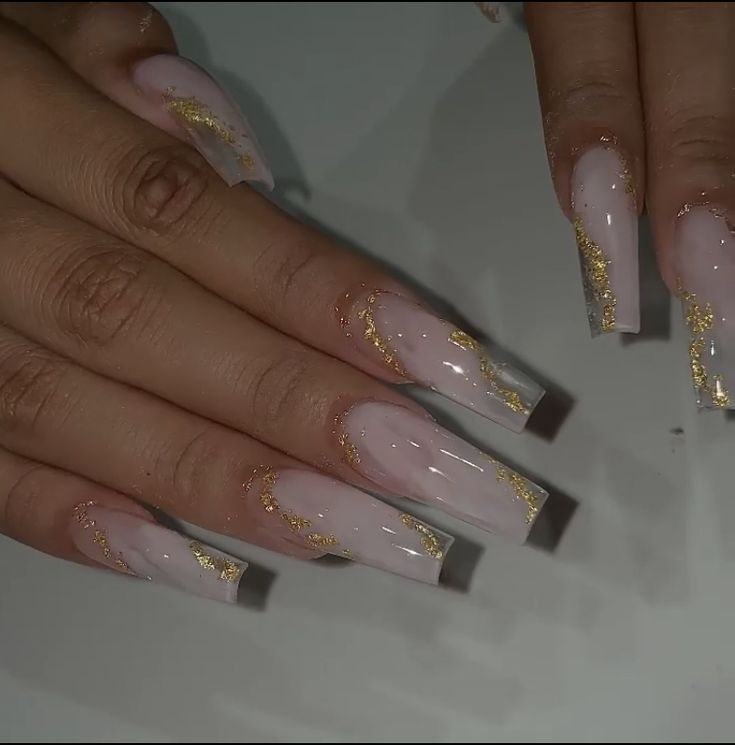 Sophisticated Long Square Nail Design with Soft Pink Gradient and Gold Foil Accents.