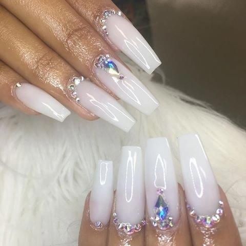 Elegant Glossy White Nail Design with Sparkling Rhinestones