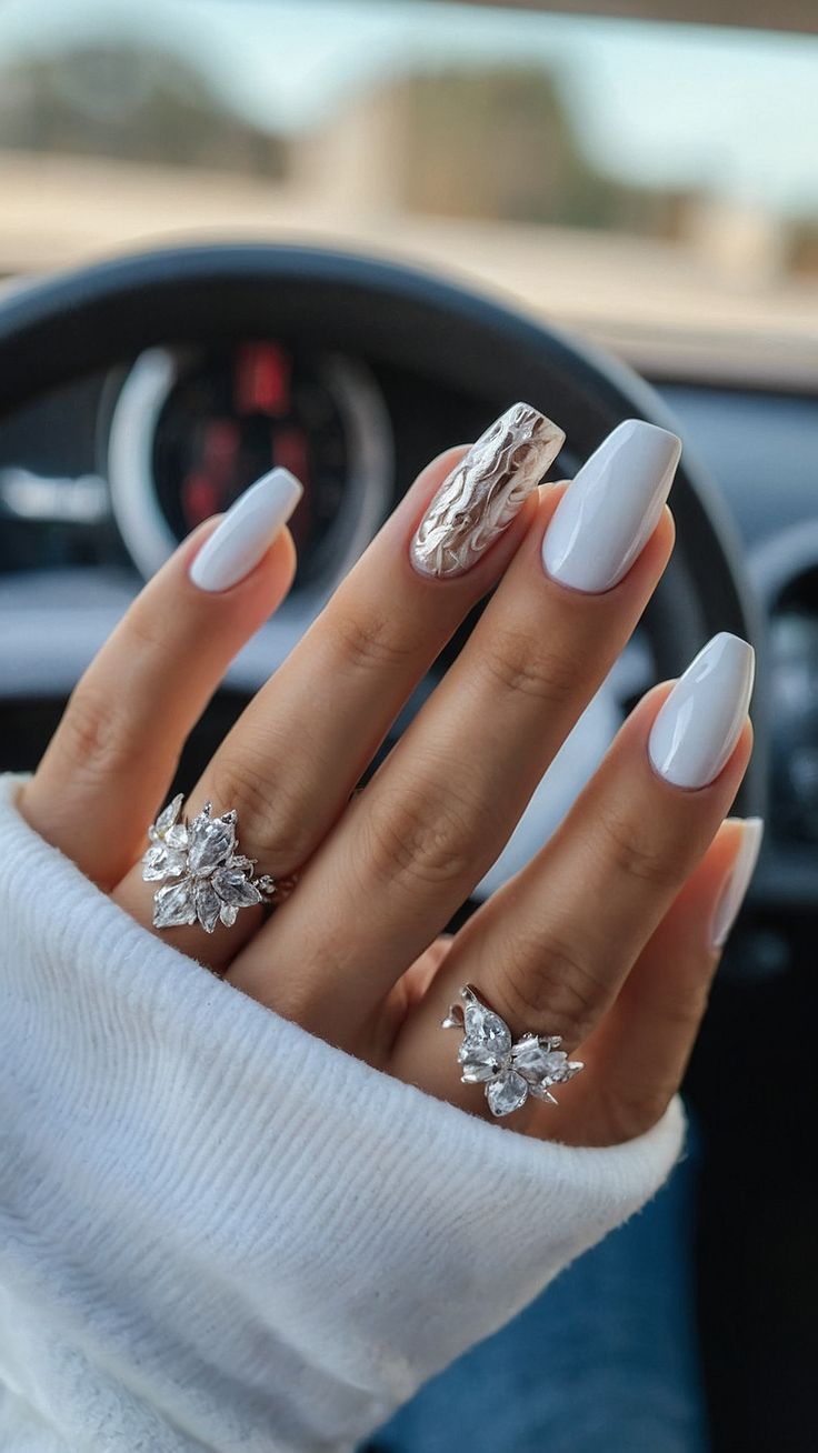 Chic White Nails with Textured Design: A Sophisticated Blend of Style and Grace.