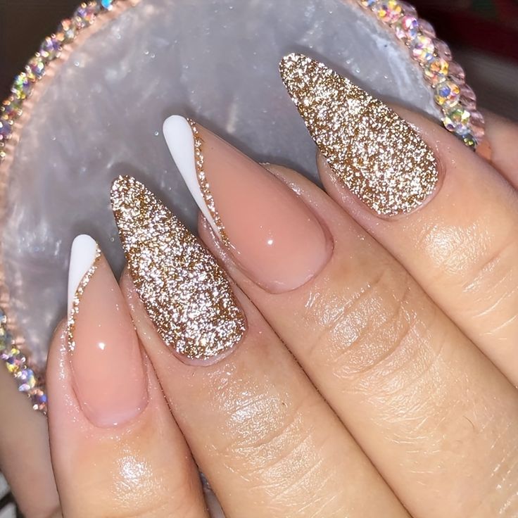 Elegant Almond-Shaped Nails with Golden Glitter Gradient and Accents