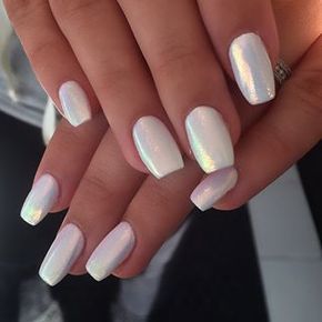 Elegant Iridescent Nail Design with Subtle Shimmer and Glossy Finish.