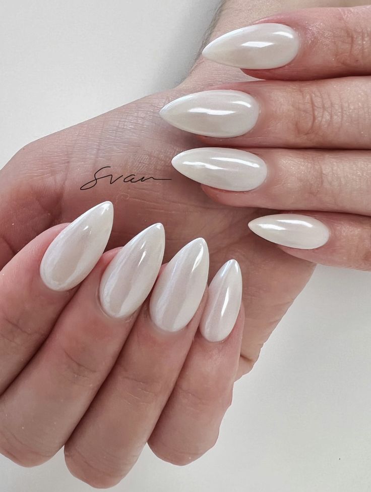 Chic Pearlescent Almond-Shaped Nails for Elegant Everyday and Special Occasions