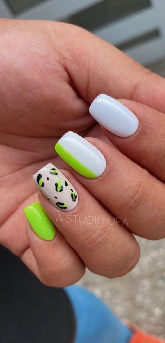 Vibrant Bold Nail Design with Fresh Contrast and Playful Animal Print Accent.