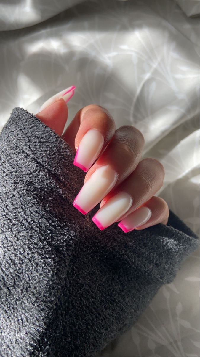 Chic Ombre Nail Design: From Soft White to Vibrant Pink Tips