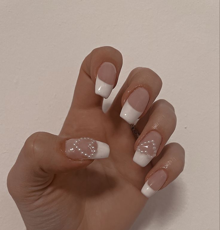 Chic French Tip Manicure: Classic Elegance Meets Modern Texture.